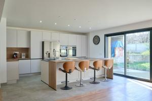 Køkken eller tekøkken på Paris Premium Family House