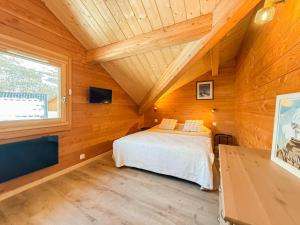 Postel nebo postele na pokoji v ubytování Chalet neuf le doux glace