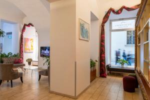 Sjónvarps- og/eða afþreyingartæki á Pertschy Palais Hotel
