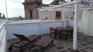 Un balcon sau o terasă la Victoria Apartments +18 fotografii