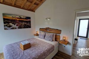 Postel nebo postele na pokoji v ubytování Wine House by Ponta Negra Azores