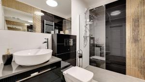 Koupelna v ubytování Comfortable Apartments with Access to the Gym Dom & House + 75 fotografií