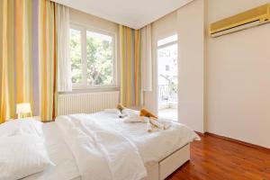 Postel nebo postele na pokoji v ubytování FeWo-Antalya Holiday Appartments