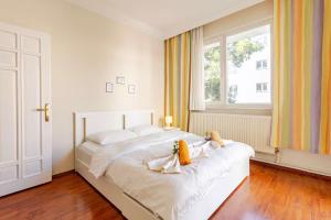 Postel nebo postele na pokoji v ubytování FeWo-Antalya Holiday Appartments