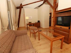 Televiisor ja/või meelelahutuskeskus majutusasutuses Bergström Hotel Lüneburg