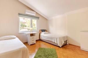 Postel nebo postele na pokoji v ubytování FeWo-Antalya Holiday Appartments