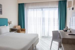 Riviera Spa Resort - Adults Only客房内的一张或多张床位