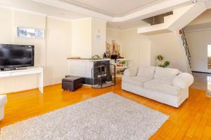 TV a/nebo společenská místnost v ubytování FeWo-Antalya Holiday Appartments