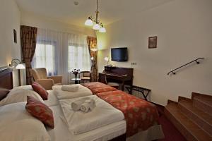 Katil atau katil-katil dalam bilik di Hotel Joseph 1699