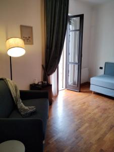 Posezení v ubytování Palazzo Cusani Charming Rooms