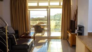 TV a/nebo společenská místnost v ubytování Lagada Resort
