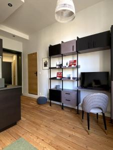 Kuchyň nebo kuchyňský kout v ubytování ID'home le Royale + 3 fotografie