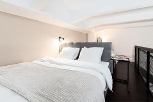 Postel nebo postele na pokoji v ubytování Modern loft-apartments in Prague