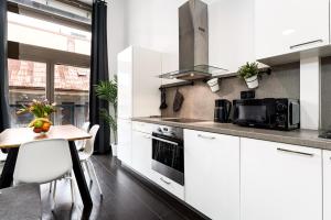 Kuchyň nebo kuchyňský kout v ubytování Modern loft-apartments in Prague