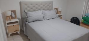 Ένα ή περισσότερα κρεβάτια σε δωμάτιο στο Ayres Apart +11 φωτογραφίες