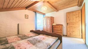 Postel nebo postele na pokoji v ubytování Ferienhaus Weps