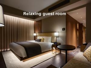 Postel nebo postele na pokoji v ubytování Mitsui Garden Hotel Roppongi Tokyo Premier