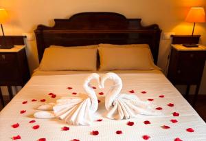 A bed or beds in a room at La Torre del Vilar