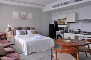 Η κουζίνα ή μικρή κουζίνα στο Axxodia- Apartments In Aeon Towers