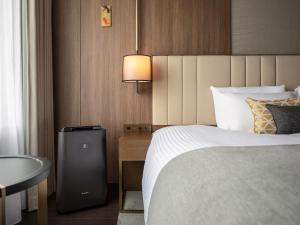 Postel nebo postele na pokoji v ubytování Mitsui Garden Hotel Roppongi Tokyo Premier