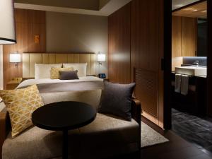 Postel nebo postele na pokoji v ubytování Mitsui Garden Hotel Roppongi Tokyo Premier