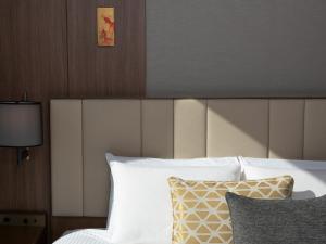 Postel nebo postele na pokoji v ubytování Mitsui Garden Hotel Roppongi Tokyo Premier