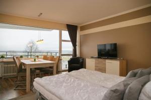 Televiisor ja/või meelelahutuskeskus majutusasutuses Prinzenhof App 29 inkl WLAN