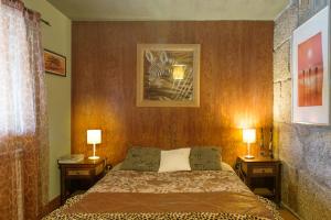 Uma cama ou camas num quarto em Casa Ci