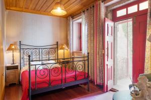 Uma cama ou camas num quarto em Casa Ci
