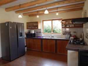 Η κουζίνα ή μικρή κουζίνα στο Casa Higospampa, 2 Floors Up to 7 Residents