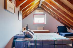 Uma cama ou camas num quarto em Casa Ci