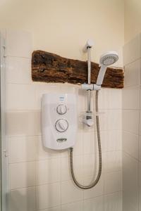 Phòng tắm tại Carol's Cottage