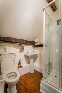 Phòng tắm tại Carol's Cottage