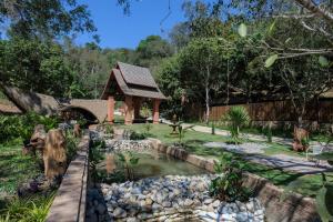Κήπος έξω από το iRETREAT Jungle Bliss, Pa Pae