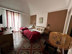 Postel nebo postele na pokoji v ubytování Terra d'amuri Rooms