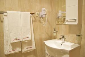 Baðherbergi á IN Hotel Zlatar ex Zlatarski Biseri