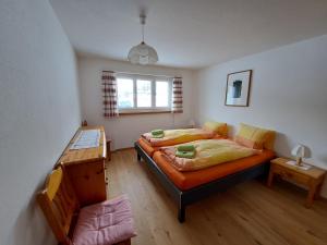 Postel nebo postele na pokoji v ubytování Haus am See