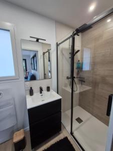 Ένα μπάνιο στο Chambre avec accès privé