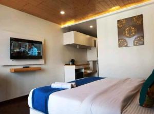 Μια τηλεόραση ή/και κέντρο ψυχαγωγίας στο Elements Boutique Hotel