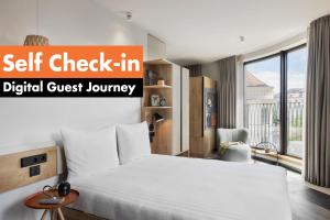 Stay KooooK Leipzig City - Online Check In客房内的一张或多张床位
