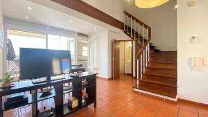 TV a/nebo společenská místnost v ubytování Penthouse Duplex Marina Plaza T1 HsR Marina Vilamoura