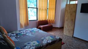Hotel Alpine View客房内的一张或多张床位