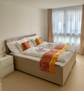Postel nebo postele na pokoji v ubytování Engler Apartments