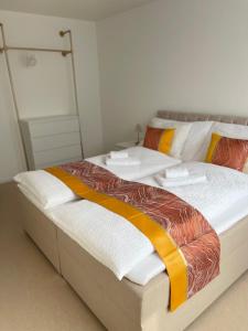 Postel nebo postele na pokoji v ubytování Engler Apartments