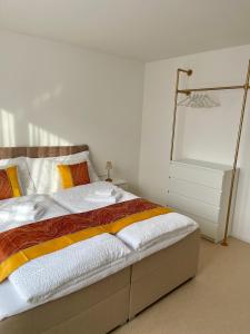 Postel nebo postele na pokoji v ubytování Engler Apartments
