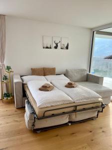 Postel nebo postele na pokoji v ubytování Engler Apartments