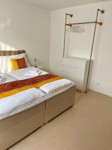 Postel nebo postele na pokoji v ubytování Engler Apartments