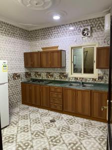 Η κουζίνα ή μικρή κουζίνα στο شقق زد السكنية