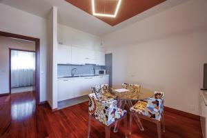 Kuchyň nebo kuchyňský kout v ubytování Residence Hotel Torino Uno