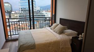 En eller flere senge i et værelse på vestrip - taj - 97, cerca a el parque de la 93